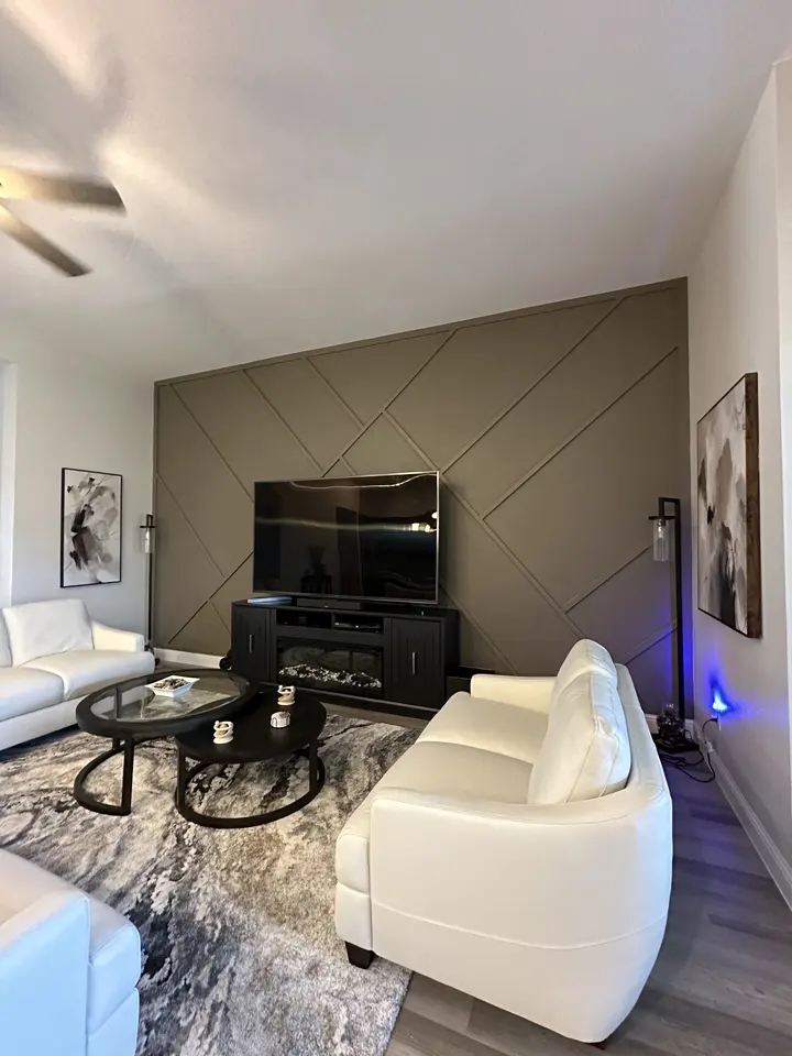 Diagonal panel accent wall seen from the side of the room